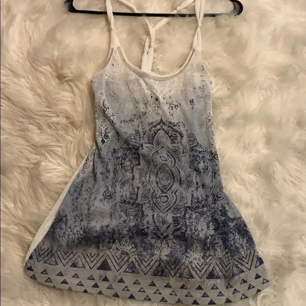 Small tank top with cross crossed back.